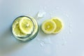 Refreshing cold lemon Cocktail on white background. Royalty Free Stock Photo