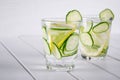 Refreshing cucumber cocktail, lemonade, detox water in a glasses on a white background. Royalty Free Stock Photo