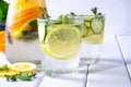 Refreshing cucumber cocktail, lemonade, detox water in a glasses on a white background. Royalty Free Stock Photo