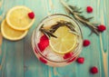 Refreshing detox water with fruits in jar, close-up