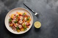 Refreshing dish of fish in citrus juice. Peruvian shrimp, prawn Ceviche marinated in oranges and lime.