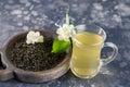 Refreshing drink in a glass cup. Green tea with jasmine. Royalty Free Stock Photo