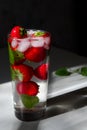 Refreshing drink with strawberries, mint and ice Royalty Free Stock Photo