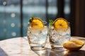 Refreshing duo Glasses filled with the perfect blend of gin and tonic