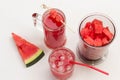 Refreshing fruit beverage with ice from watermelon. Slice of watermelon. Pieces of watermelon in blender jar