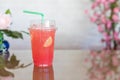 Refreshing fruit punch beverage in glass. Mixed cocktails, party punch and frozen summer drinks.