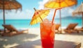 Refreshing Fruit Punch with Umbrella on Beach, Perfect for Summer Getaways Royalty Free Stock Photo