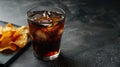 Refreshing glass of cola with ice