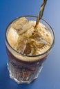 Refreshing glass of cola with lemon and ice Royalty Free Stock Photo