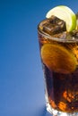 Refreshing glass of cola with lemon and ice Royalty Free Stock Photo