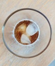 A Refreshing Glass of Iced Lemon Tea Resting on a Wooden Table, CafÃ© in Bangkok.