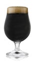A refreshing glass of stout, in a schooner glass, with condensation