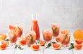 Refreshing grapefruit smoothie with rosemary and ice