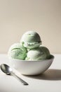 Refreshing green mint ice cream scoops in a bowl. Royalty Free Stock Photo