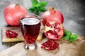 Refreshing and healthy pomegranate juice and pomegranate fruit Royalty Free Stock Photo