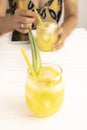 Refreshing homemade pineapple juice with ice. Fresh and tropical drink for summer Royalty Free Stock Photo