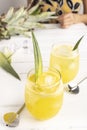 Refreshing homemade pineapple juice with ice. Fresh and tropical drink for summer Royalty Free Stock Photo