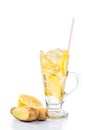 Refreshing ice cold ginger lemon tea in transparent glass on vertical format