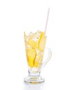 Refreshing ice cold ginger lemon tea in transparent glass on vertical orientation Royalty Free Stock Photo