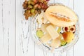 Refreshing ice pops over silver tray. Pear, peach, grape, lime, honeydew white sangria paletas - popsicles. Top view