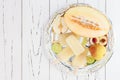 Refreshing ice pops over silver tray. Pear, peach, grape, lime, honeydew white sangria paletas - popsicles. Top view