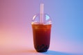 Refreshing iced bubble tea with tapioca pearls and straw in plastic cup Royalty Free Stock Photo