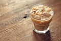 Refreshing Iced Coffee in a Glass on Wooden Table