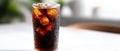 The refreshing iced cola drink in a glass full of ice cubes. AI generated image Royalty Free Stock Photo