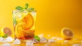 Refreshing iced tea with lemon and mint on yellow background