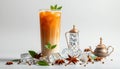 Refreshing Iced Thai Tea with Mint and Star Anise on Crushed Ice in a Clean White Studio Setting with a Gradient Background Royalty Free Stock Photo