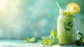 Refreshing kiwi and spinach smoothie with lemon and chia seeds in a glass jar. Healthy eating, detox, and dieting concept