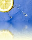 Refreshing lemon and water reflection