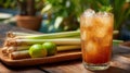 Refreshing Lemongrass Drink with Limes on Wooden Table Royalty Free Stock Photo