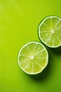 Refreshing Lime and Cut Lime on Green Background AI Generated