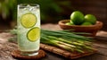Refreshing Lime Drink with Lemongrass on Wooden Table Royalty Free Stock Photo