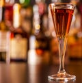 Refreshing liqueur in a tall glass, alcoholic drink prepared by