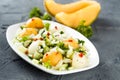 Refreshing melon salad with cucumber and chili