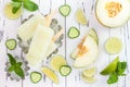 Refreshing mexican style ice pops - cucumber, lime, honeydew margarita paletas - popsicles. Top view. Cinco de Mayo recipe