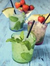 Refreshing mojito on a rustic blue table Royalty Free Stock Photo