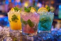 Refreshing neon cocktails in bar with bokeh lights behind Royalty Free Stock Photo
