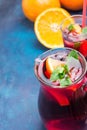 Refreshing Non-Alcoholic Spanish Sangria from Variety of Fruits Orange Citrus Pomegranate Grapes Berries and Fresh Mint in Pitcher Royalty Free Stock Photo