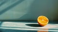 Refreshing orange slice on a reflective surface Royalty Free Stock Photo