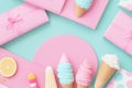 Flat lay background in pastel blue and pink with ice cream and envelopes in summer mood Royalty Free Stock Photo