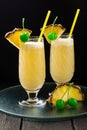 Refreshing pineapple cocktail with coconut cream