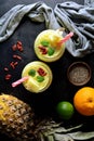 Refreshing Pineapple Smoothie with Oranges, Lime, Chia Seeds and Goji Berries Royalty Free Stock Photo