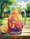 A refreshing pitcher of fruit-infused water on a wooden table with a garden backdrop Royalty Free Stock Photo