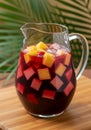 Refreshing Red Sangria with Mango and Strawberry in Glass Pitcher Royalty Free Stock Photo