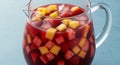 Refreshing Red Sangria with Strawberries and Mango in Glass Pitcher Royalty Free Stock Photo