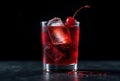 Refreshing ruby-red cocktail with ice cubes and a single cherry garnish in a rocks glass. Generative AI Royalty Free Stock Photo