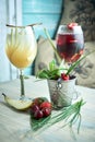 Refreshing sangria or punch with fruits in glass and pincher jpg Royalty Free Stock Photo